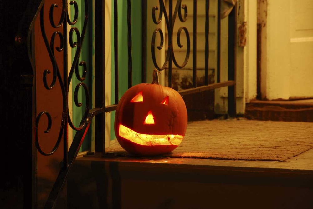 OR, Portland Lighted jack-o-lantern on porch